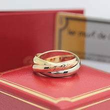 Lade das Bild in den Galerie-Viewer, Les must de Cartier Trinity Tricolour 18KT Gold mit Box & Papiere in Gr. 53