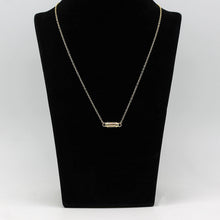 Lade das Bild in den Galerie-Viewer, Tiffany & Co. Halskette mit Zylinder Anhänger in 18KT Gold