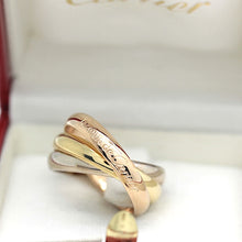 Lade das Bild in den Galerie-Viewer, Les must de Cartier Trinity Tricolour 18KT Gold mit Box & Papiere in Gr. 53