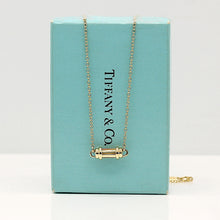 Lade das Bild in den Galerie-Viewer, Tiffany &amp; Co. Halskette mit Zylinder Anhänger in 18KT Gold
