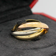 Lade das Bild in den Galerie-Viewer, Les must de Cartier Trinity Tricolour 18KT Gold mit Cartier Box in Gr. 54
