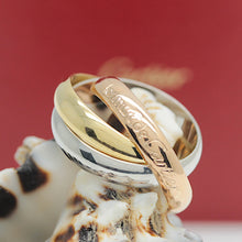Lade das Bild in den Galerie-Viewer, Les must de Cartier Trinity Tricolour 18KT Gold mit Box &amp; Papiere in Gr. 49
